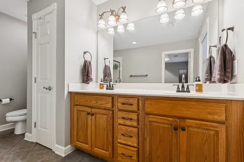 a bathroom with a tub and a shower
