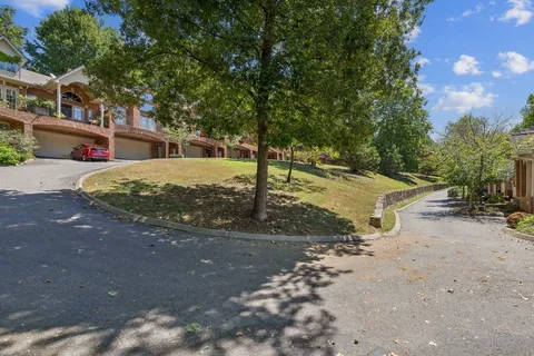 a view of a swimming pool with lounge chair