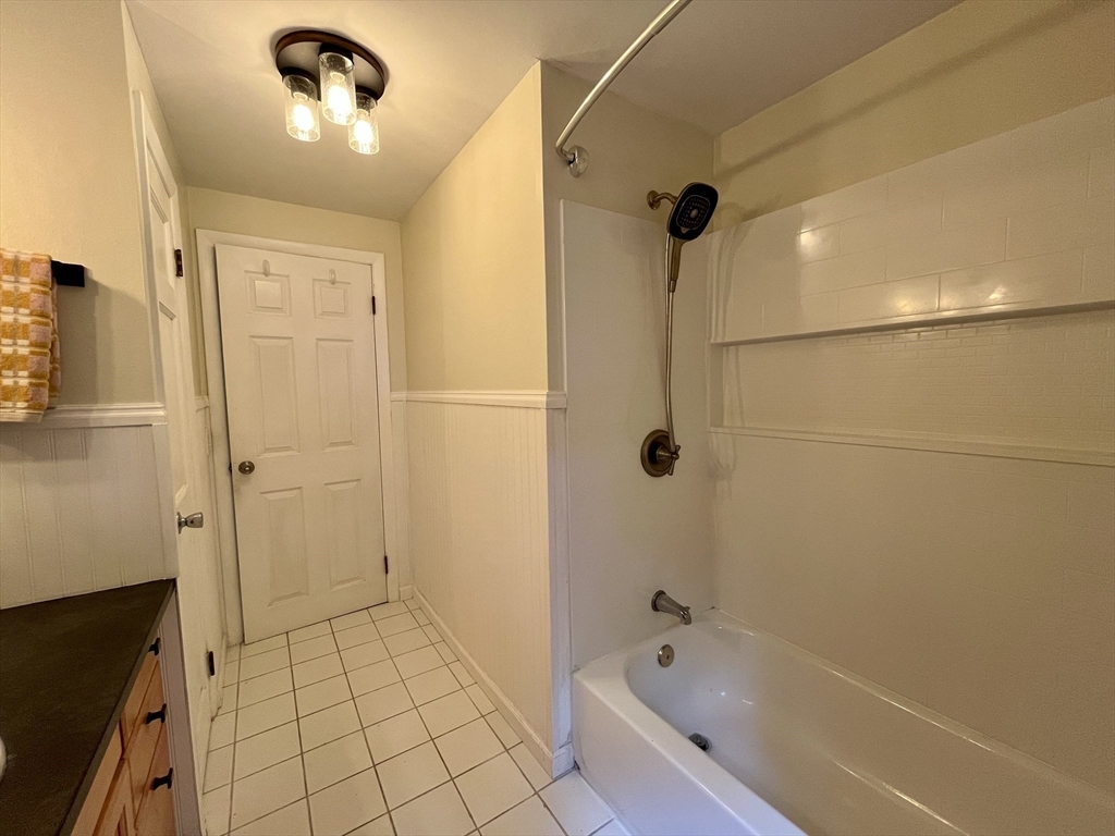 947 Burts Pit Road Northampton, MA 01062 - Photo 31 of 42 a bathroom with a bathtub and shower