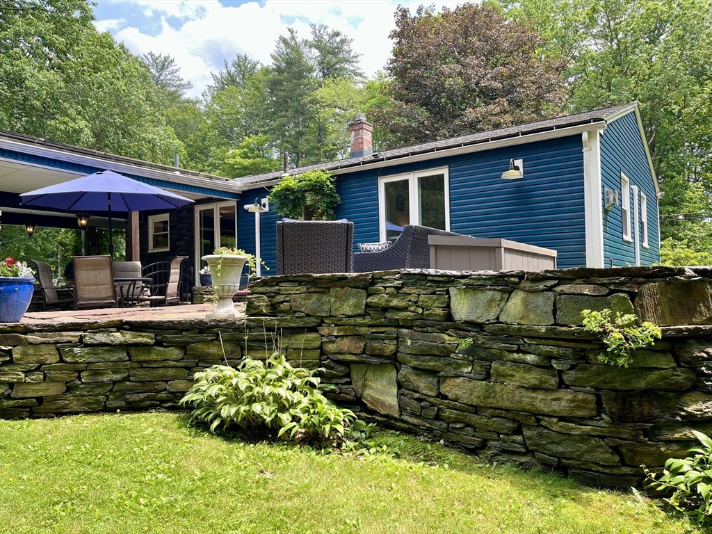 947 Burts Pit Road Northampton, MA 01062 - Photo 7 of 42 a front view of a house with swimming pool