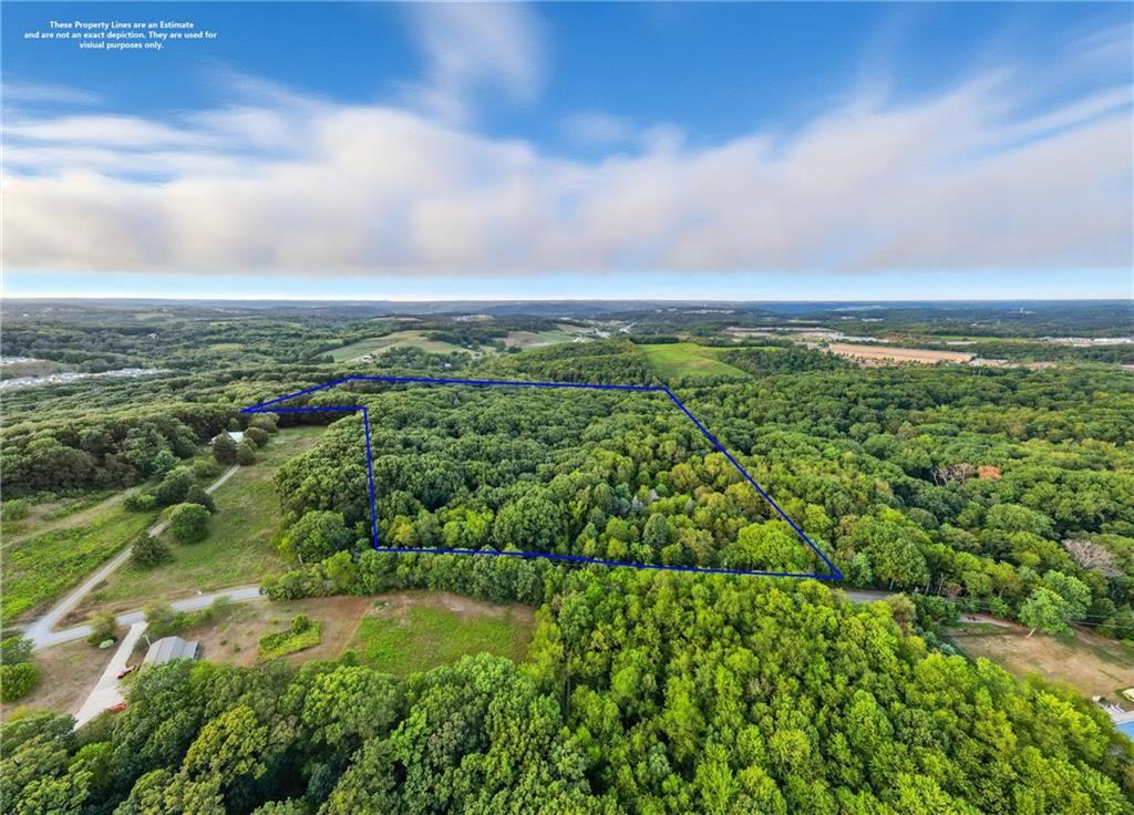 221 Zehner School Road Zelienople, PA 16063 - Photo 11 of 16 a view of a city with lush green forest