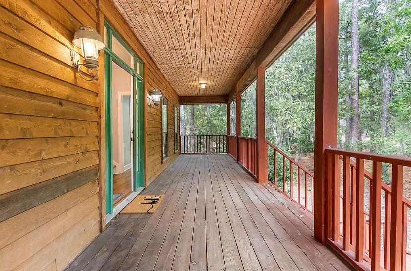 1525 Black Island Road Darien, GA 31305 - Photo 28 of 41 a view of balcony with wooden floor