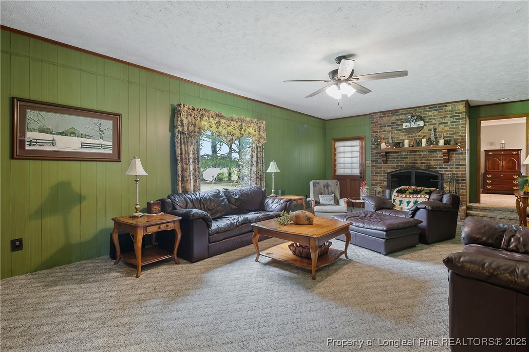 5017 Goldsboro Road Wade, NC 28395 - Photo 20 of 50 a living room with furniture and a large window