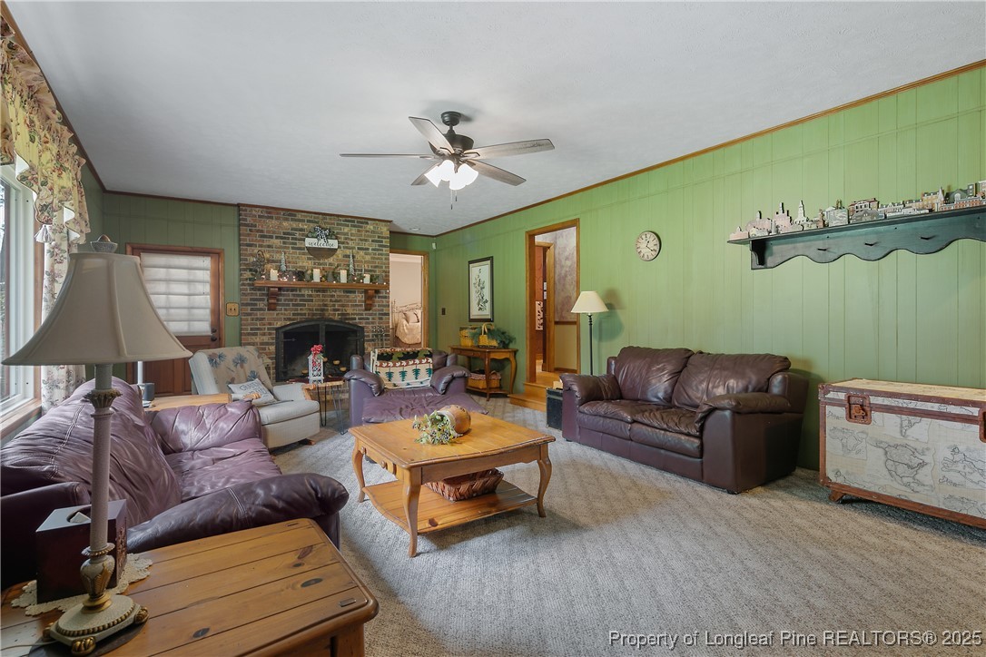 5017 Goldsboro Road Wade, NC 28395 - Photo 21 of 50 a living room with furniture and a window