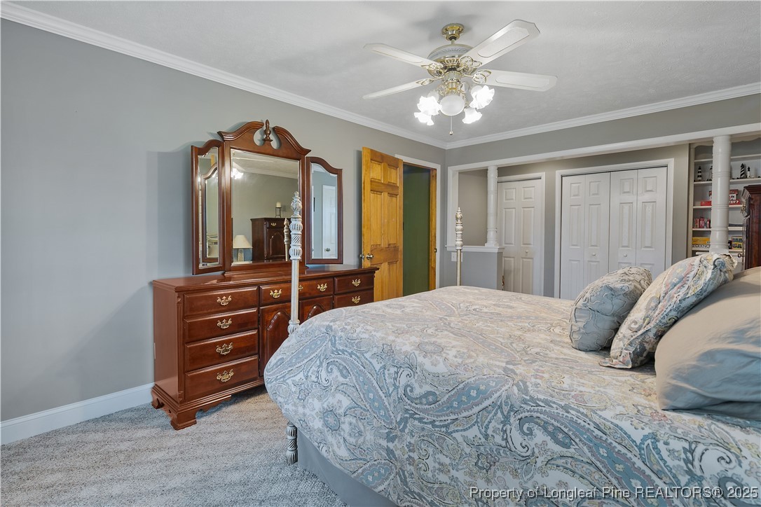 5017 Goldsboro Road Wade, NC 28395 - Photo 28 of 50 a bedroom with a bed and a dresser
