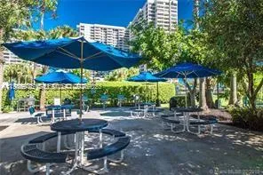 a view of hall with a floor to ceiling window and a room