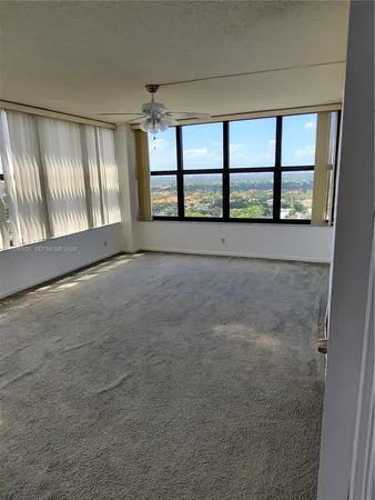 a view of a sink and a mirror