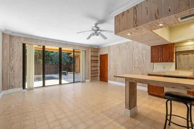 a view of room with furniture and window