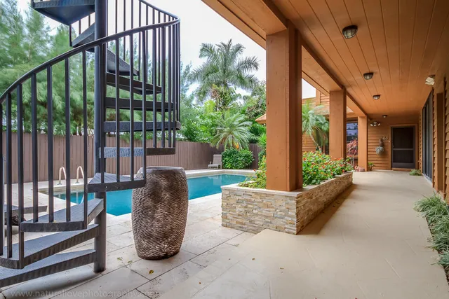 a view of balcony with furniture