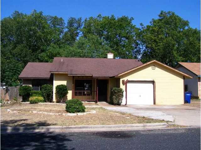 4802 Brook Crest Road Austin, TX 78744 - Photo 1 of 1 a view of a house with a yard and plant