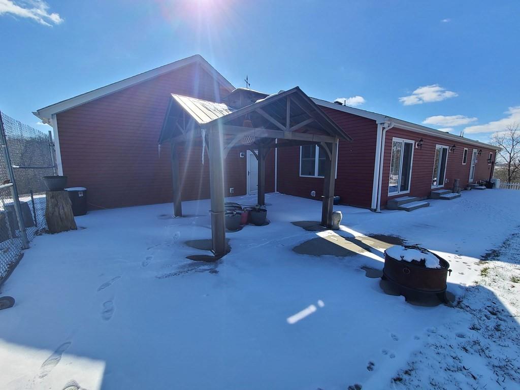 1101 Tin Town Road Sligo, PA 16255 - Photo 11 of 41 a room with gym equipment and wooden walls