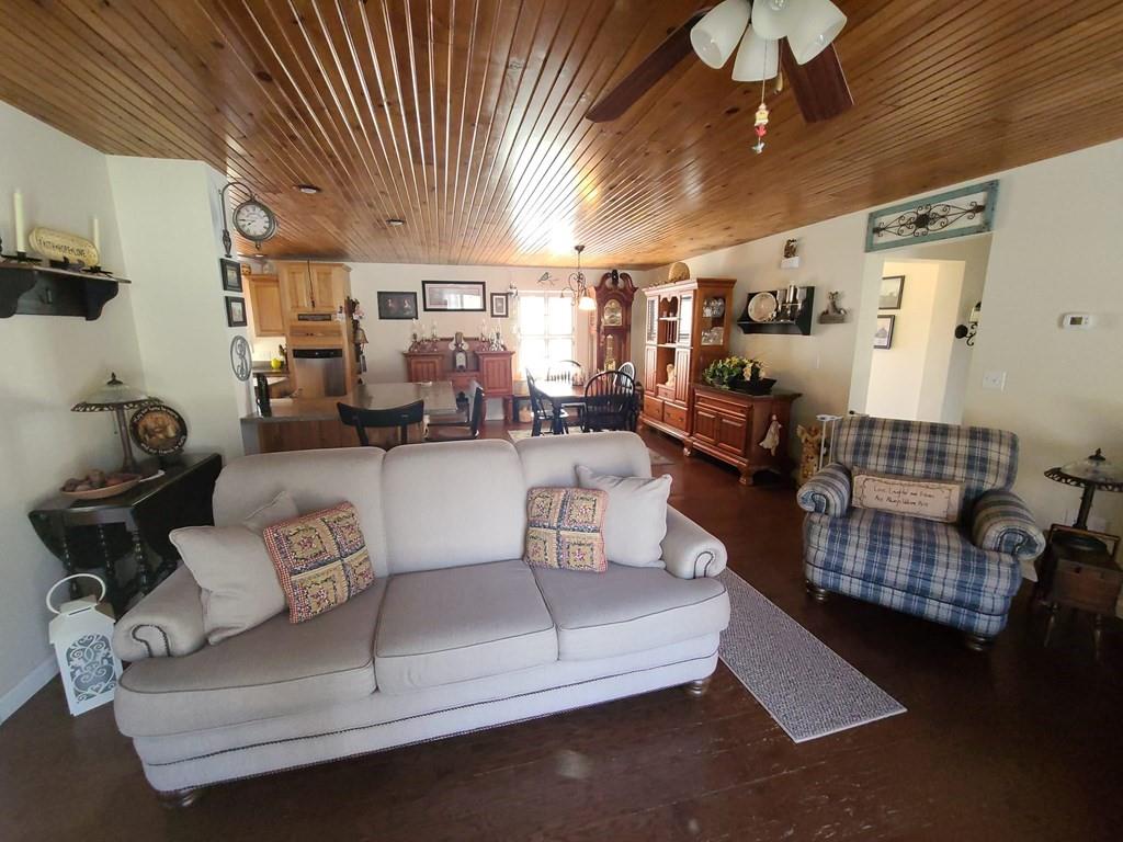 1101 Tin Town Road Sligo, PA 16255 - Photo 14 of 41 a living room with furniture and a chandelier