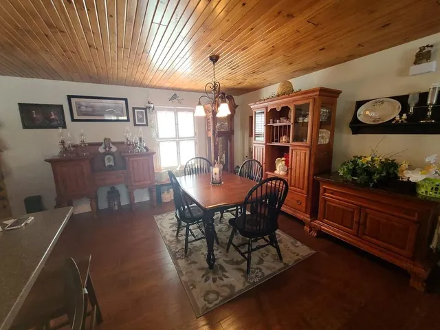 a kitchen with stainless steel appliances granite countertop a stove and a refrigerator