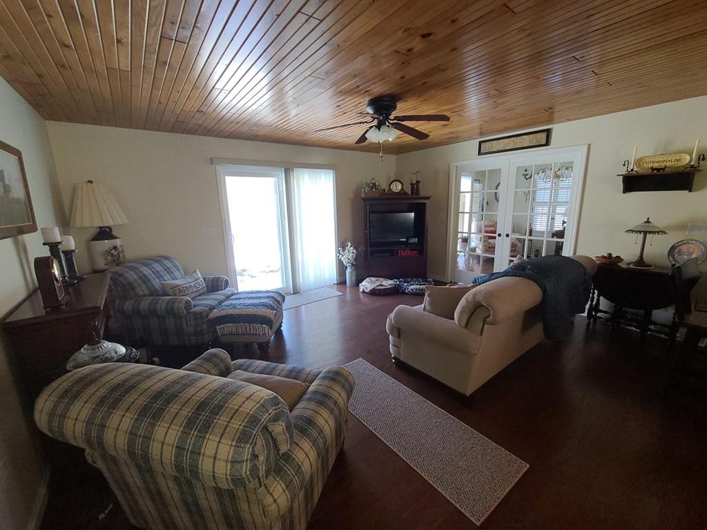 1101 Tin Town Road Sligo, PA 16255 - Photo 23 of 41 a living room with furniture and a large window
