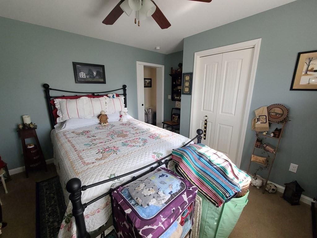 1101 Tin Town Road Sligo, PA 16255 - Photo 30 of 41 a bed sitting in a bedroom next to a window