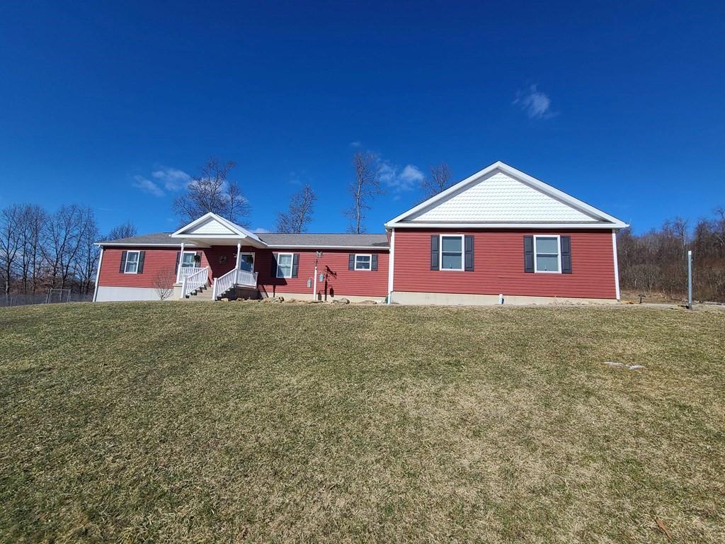 1101 Tin Town Road Sligo, PA 16255 - Photo 3 of 41 a front view of a house with garden