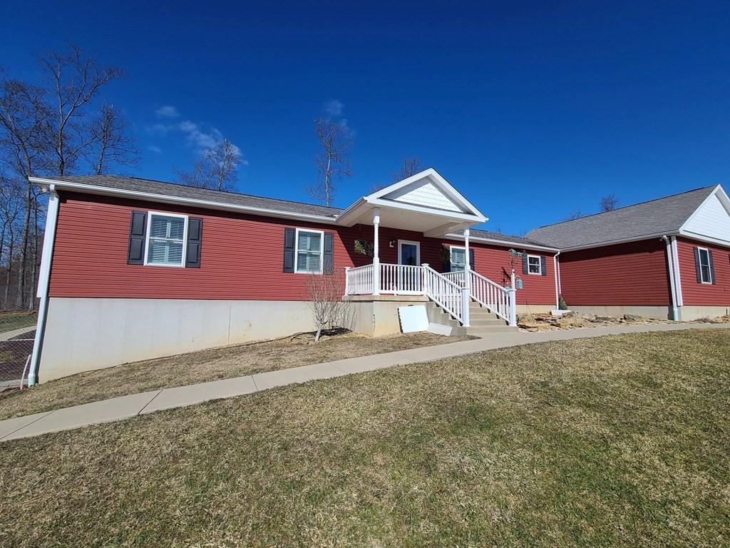 1101 Tin Town Road Sligo, PA 16255 - Photo 4 of 41 a front view of a house with a yard