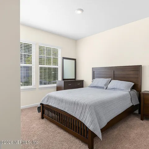 a view of a fountain in front of a house