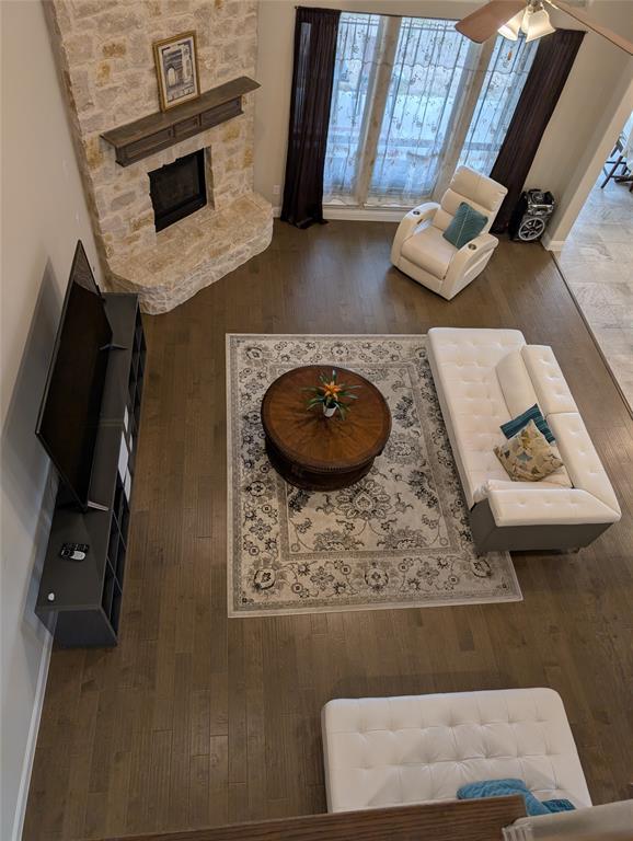 2630 Flat Bush Avenue Midlothian, TX 76065 - Photo 4 of 32 a living room with furniture and a fireplace