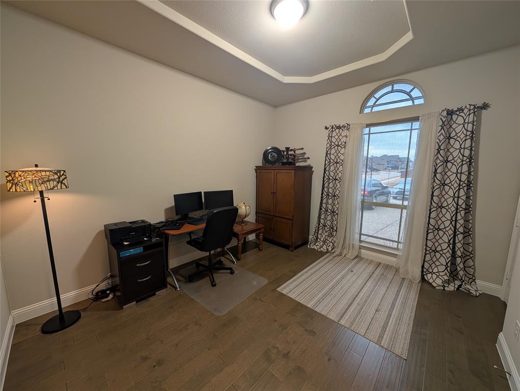 2630 Flat Bush Avenue Midlothian, TX 76065 - Photo 7 of 32 a view of a workspace with furniture and a window