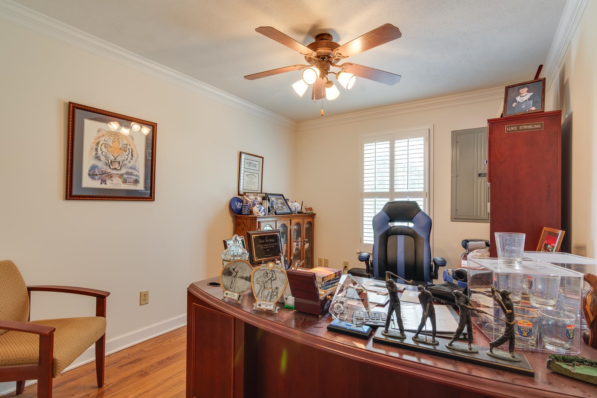 9102 Highway 76 Stanton, TN 38069 - Photo 22 of 27 Office area with crown molding, ceiling fan, and wood finished floors