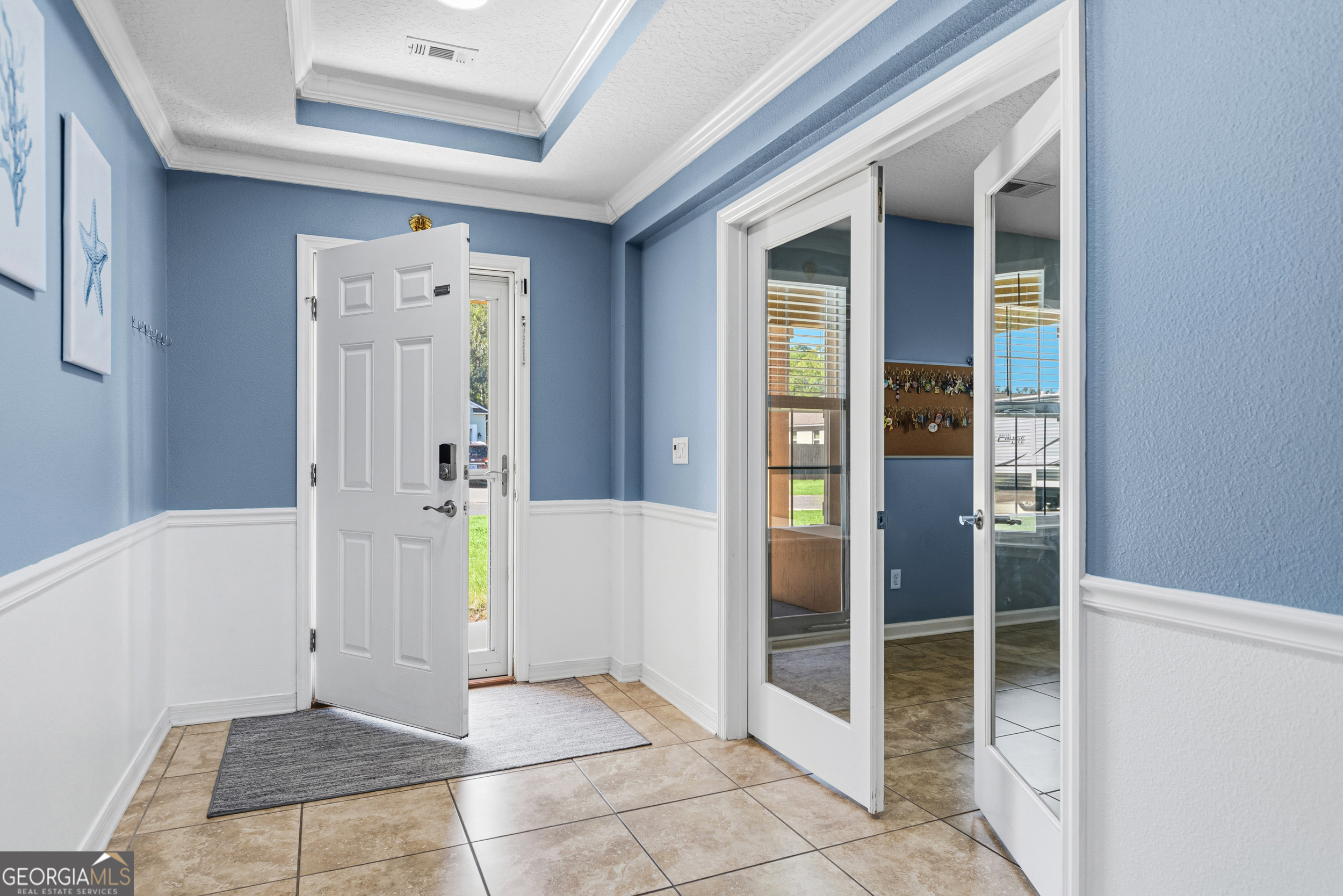 135 Walnut Way Kingsland, GA 31548 - Photo 12 of 35 a view of front door with hallway