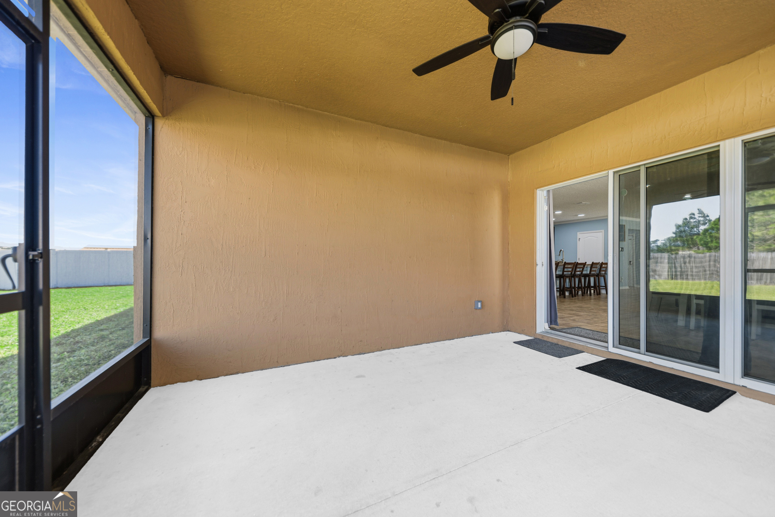 135 Walnut Way Kingsland, GA 31548 - Photo 28 of 35 a bedroom with a bed and a window