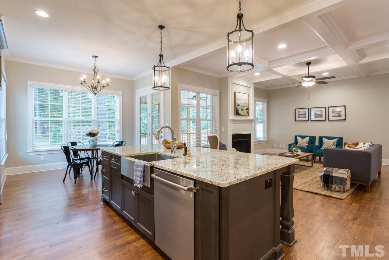 4613 Pleasant Pointe Way Raleigh, NC 27613 - Photo 5 of 25 a large kitchen with a table and chairs