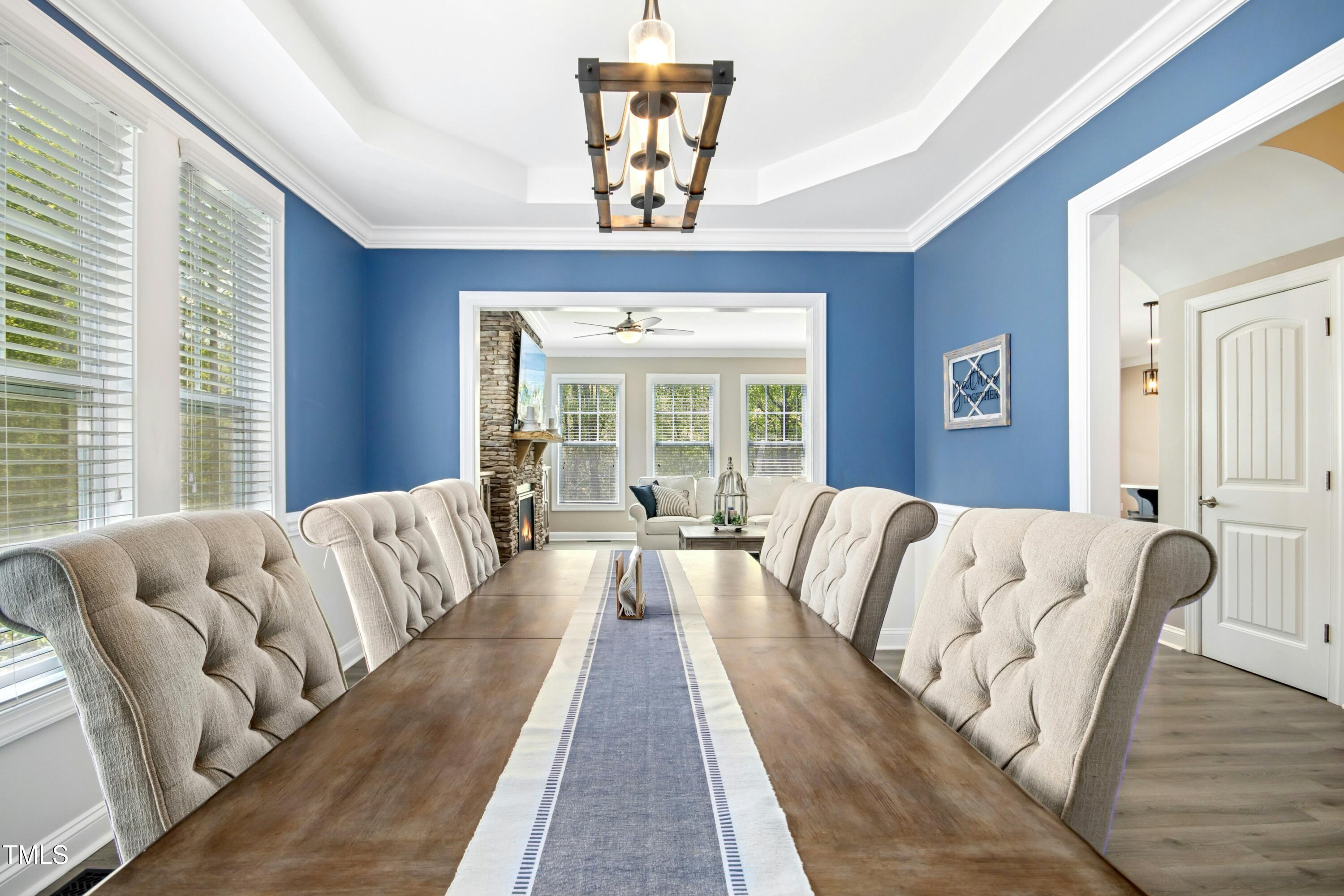 44 South Wilders Ridge Way Clayton, NC 27527 - Photo 10 of 56 a living room with furniture and a large window