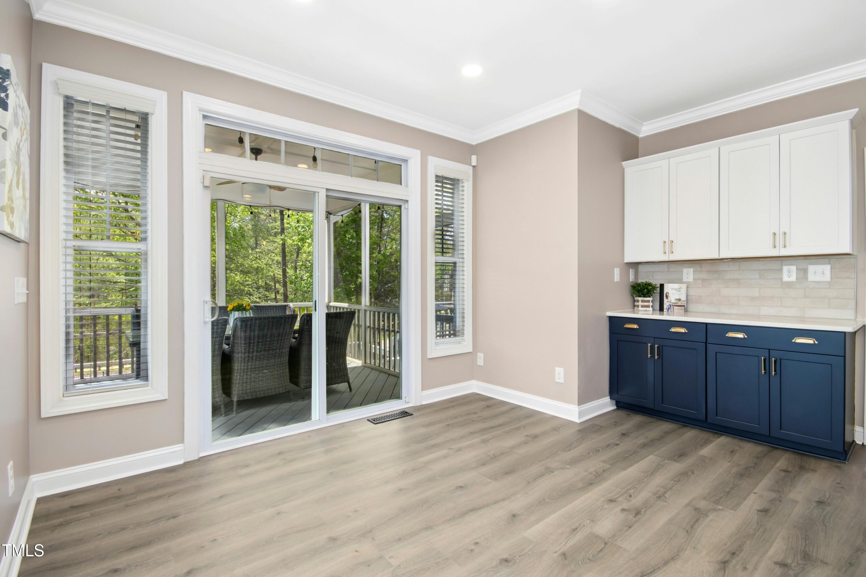 44 South Wilders Ridge Way Clayton, NC 27527 - Photo 19 of 56 a view of a kitchen with wooden floor and cabinets
