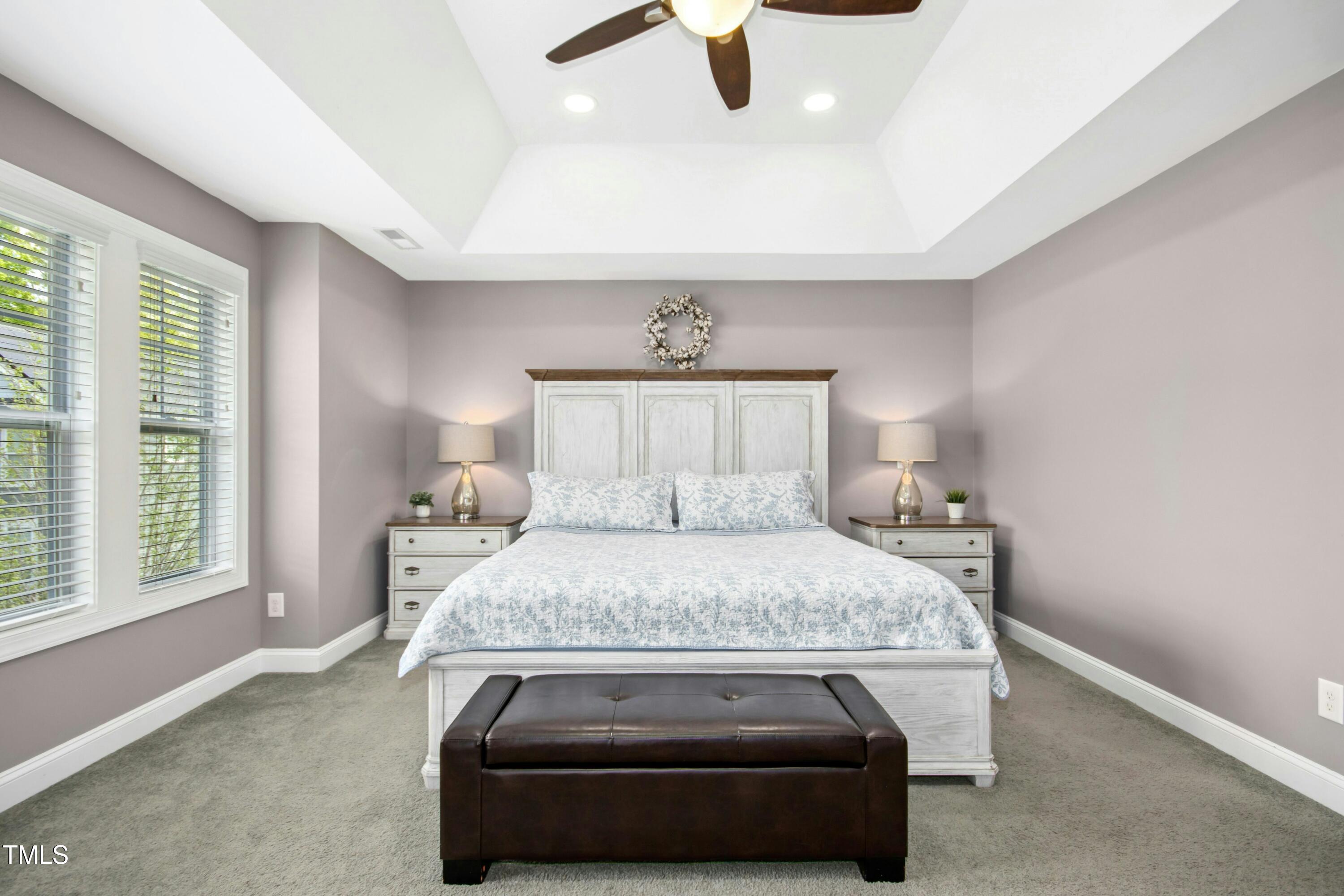 44 South Wilders Ridge Way Clayton, NC 27527 - Photo 24 of 56 a bedroom with a bed and window
