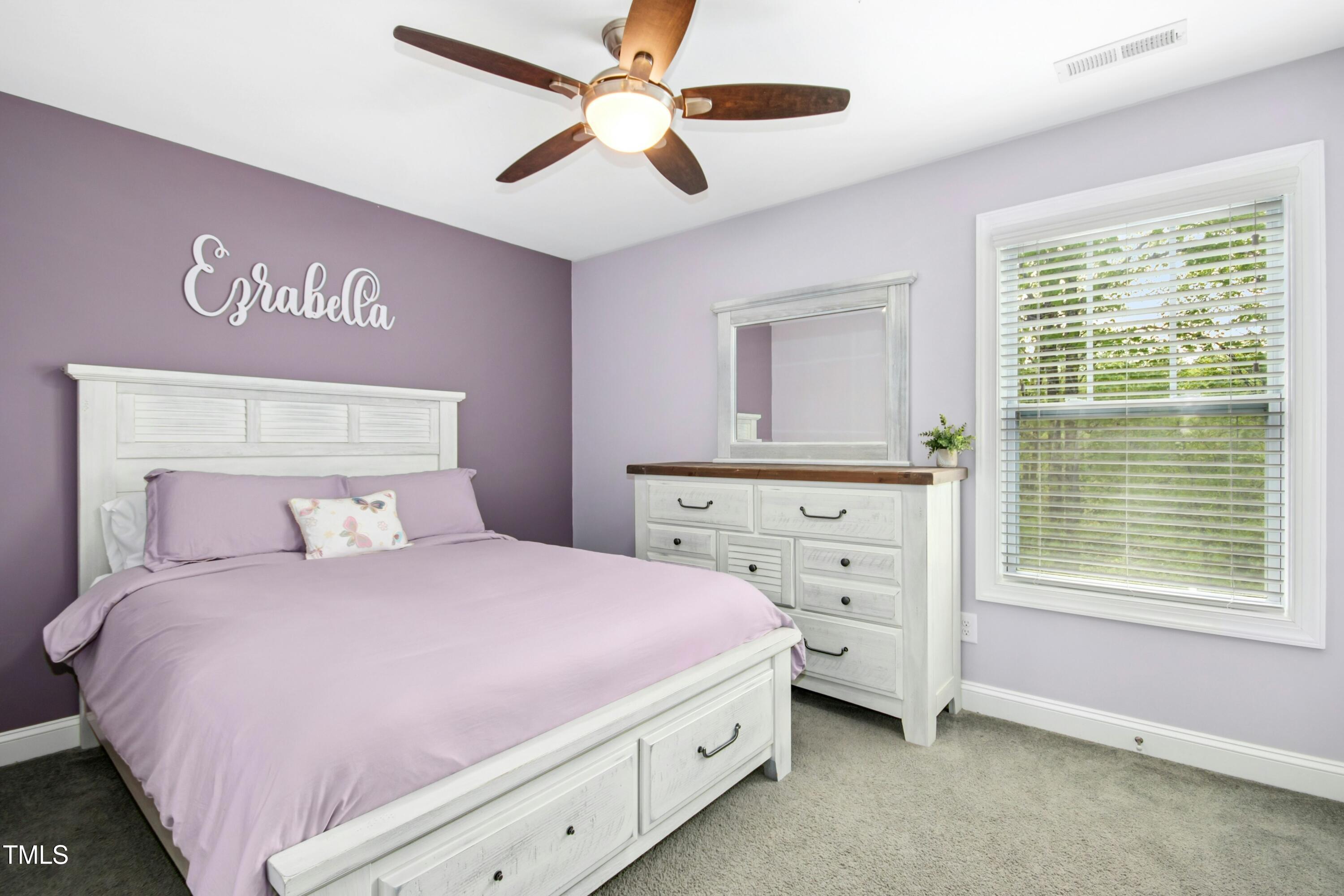 44 South Wilders Ridge Way Clayton, NC 27527 - Photo 29 of 56 a bedroom with a bed and a window