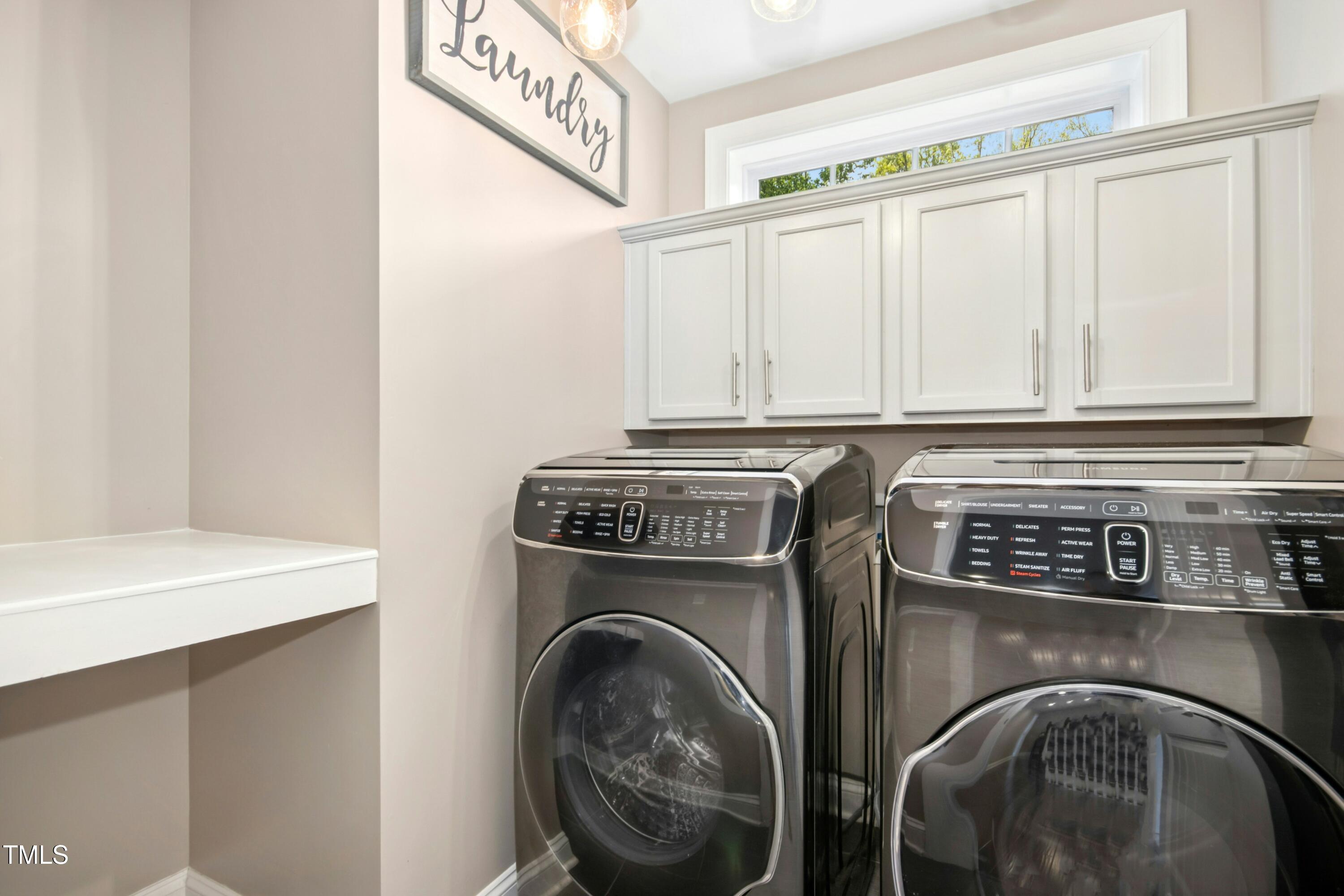 44 South Wilders Ridge Way Clayton, NC 27527 - Photo 36 of 56 a utility room with dryer and washer