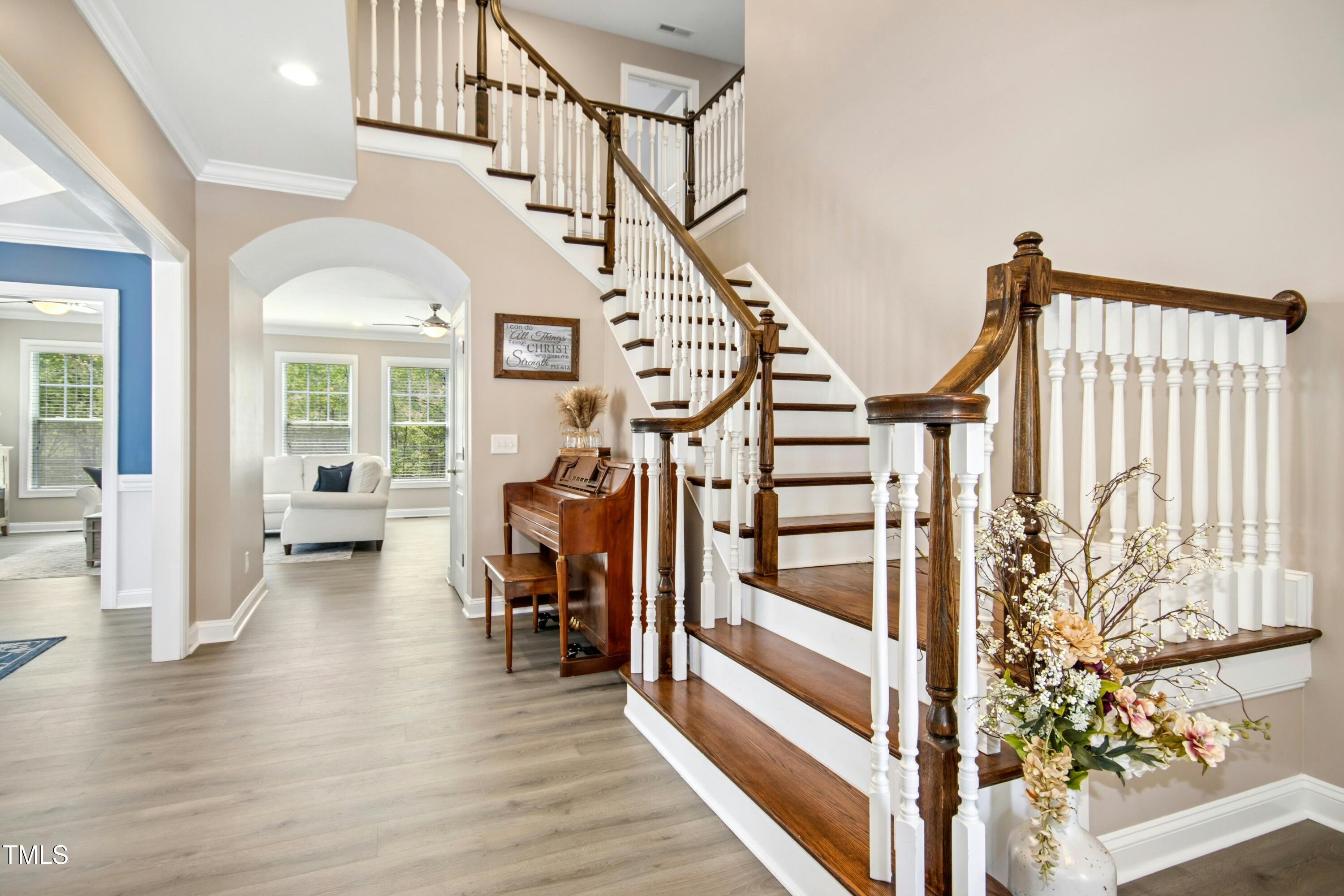 44 South Wilders Ridge Way Clayton, NC 27527 - Photo 3 of 56 a view of entryway with wooden floor and windows