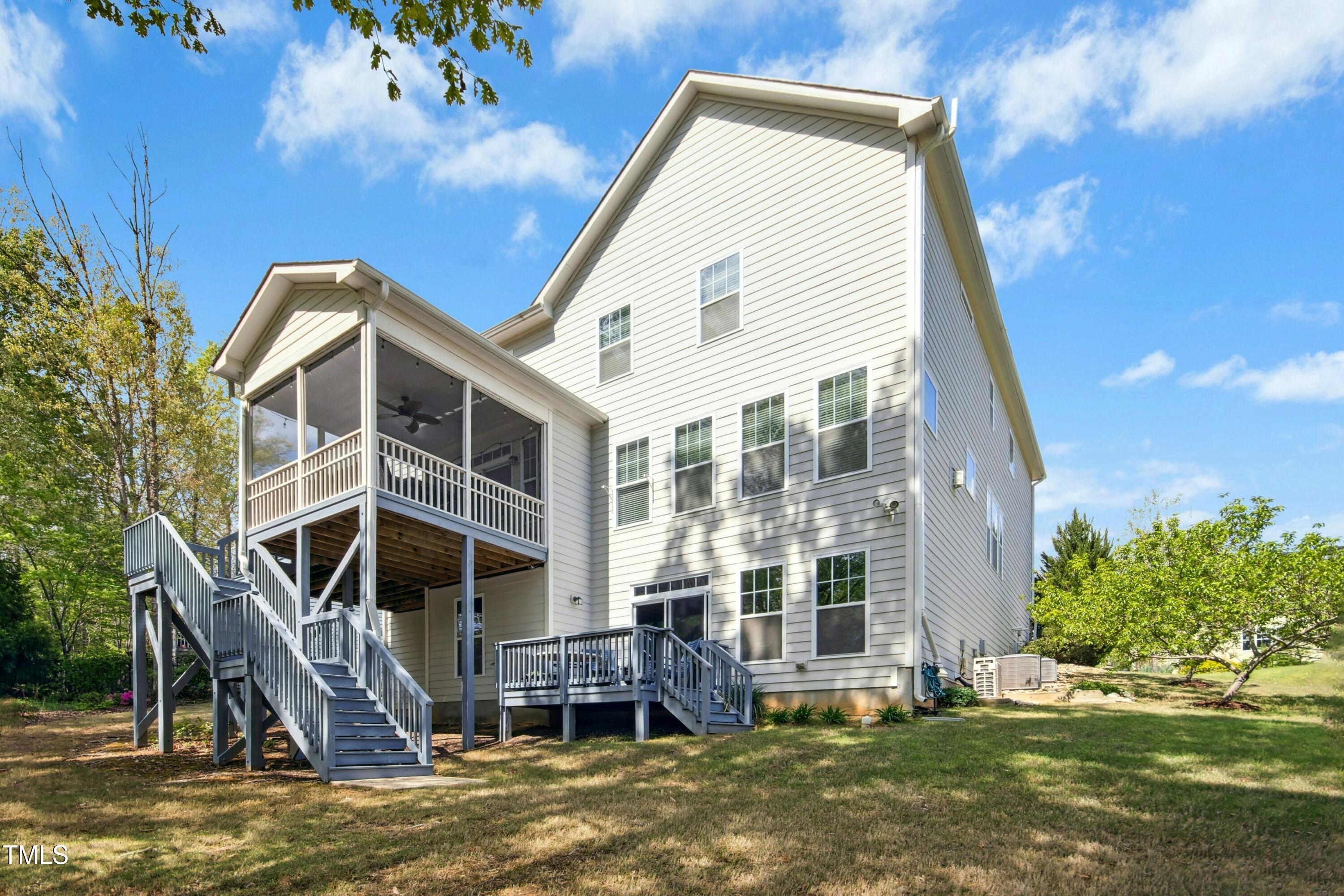44 South Wilders Ridge Way Clayton, NC 27527 - Photo 49 of 56 a front view of a house with a yard