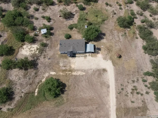 a view of a backyard of a house