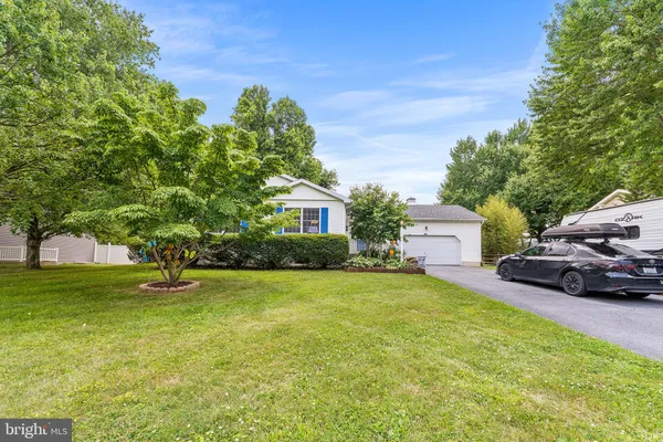 a house view with a garden space