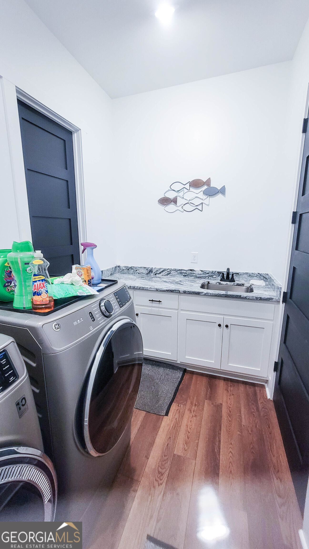 209 Lee Road Salem, AL 36874 - Photo 23 of 37 a utility room with sink dryer and washer