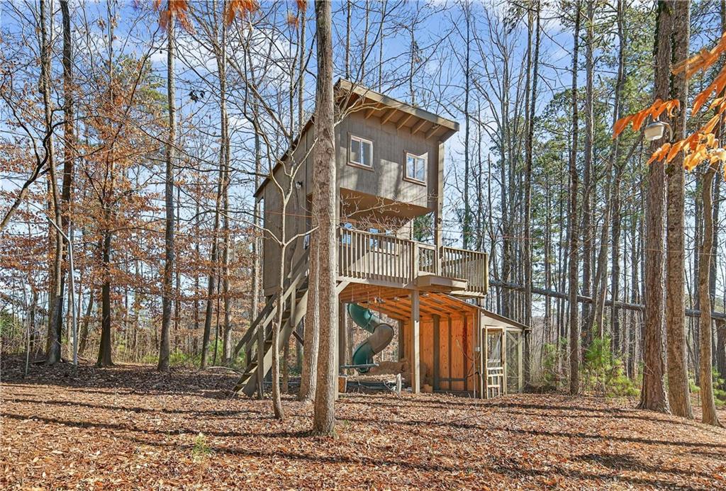 340 Scott Farm Drive Powder Springs, GA 30127 - Photo 52 of 59 a front view of a house