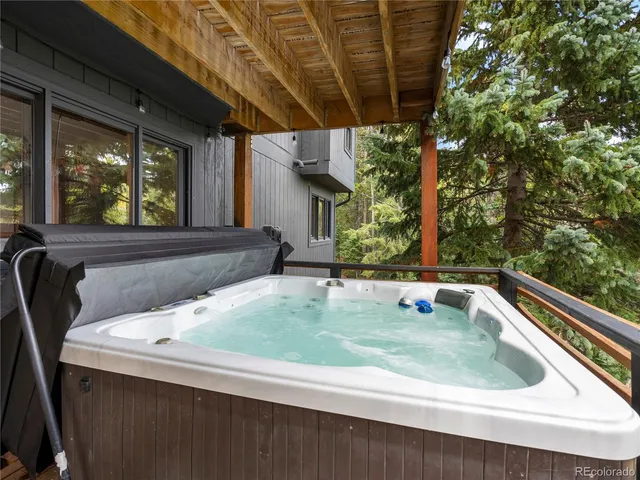 a view of a swimming pool with a patio