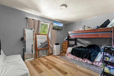 a kitchen with cabinets appliances and a sink