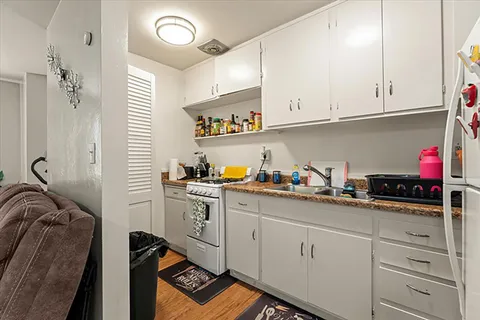 a bedroom with a bed and a closet