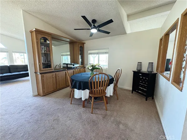 a stove top oven sitting inside of a kitchen