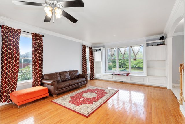 1350 Hunters Ridge West Hoffman Estates, IL 60192 - Photo 11 of 41 a living room with furniture and a large window