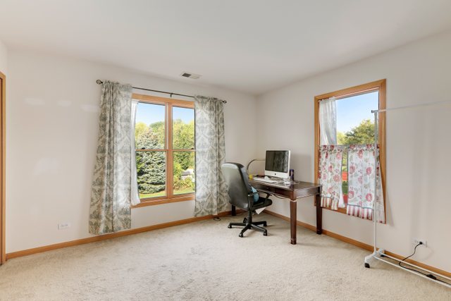 1350 Hunters Ridge West Hoffman Estates, IL 60192 - Photo 29 of 41 a view of a workspace with furniture and a window