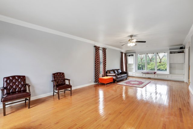 1350 Hunters Ridge West Hoffman Estates, IL 60192 - Photo 9 of 41 a view of a livingroom with furniture and a large window