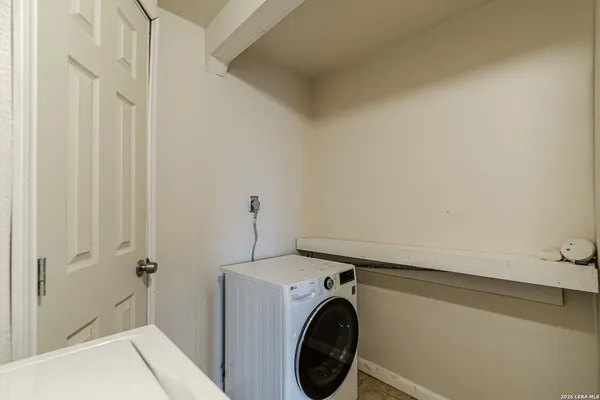 a utility room with dryer and washer