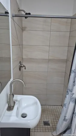a bathroom with a sink and a toilet