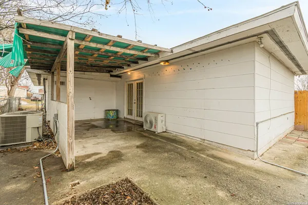 a view of a backyard of the house