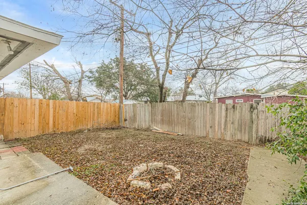 a view of backyard of house